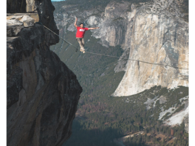 man on tightrope over canyon